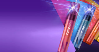 Three colorful vape pens emit blue light, labeled "VUSE GO," in a dynamic, abstract setting with overlapping purple, pink, and blue shapes against a gradient purple background.